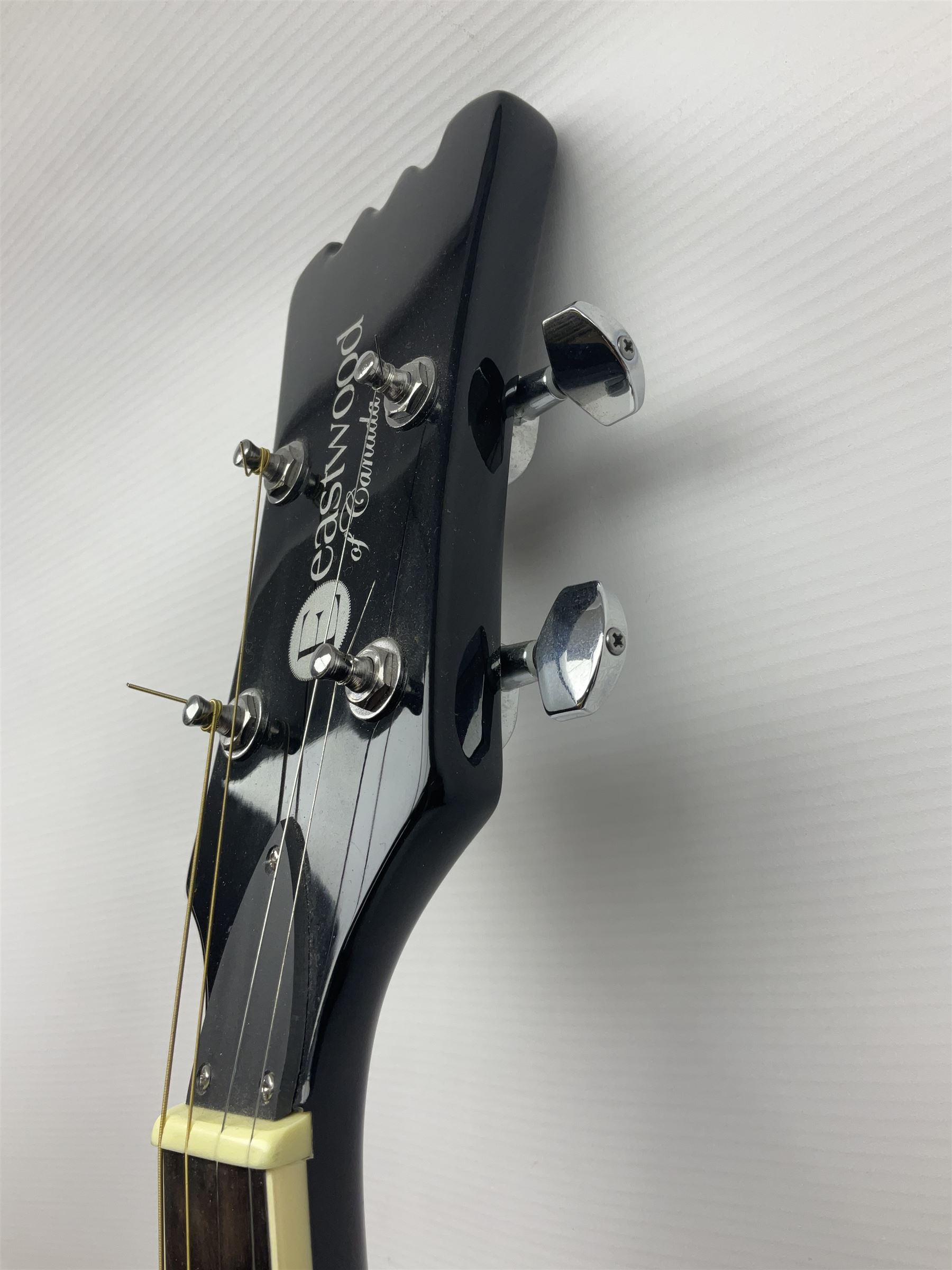 Eastwood of Canada Delta 4 electric four-string tenor resonator guitar with tobacco sunburst finish, serial no.1703437 L100cm; in original soft carrying case