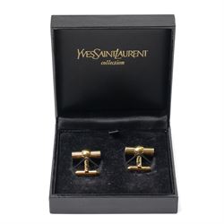 Yves Saint Laurent - pair of gold tone cufflinks, with reeded design, with original YSL box