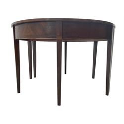 Pair of Regency mahogany D-end console tables, on square tapering supports
