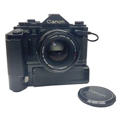 Canon A-1 camera body, serial no. 341014, with 'Canon FD 50mm 1:1.4 S.S.C.' lens, serial no. 12077119 and motor drive MA