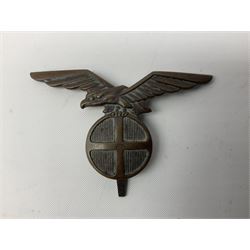 Three WW2 German visor cap badges comprising Police eagle, Political leaders eagle and Norwegian Quisling Party; all with fixings; and WW2 Polish visor cap badge (4)