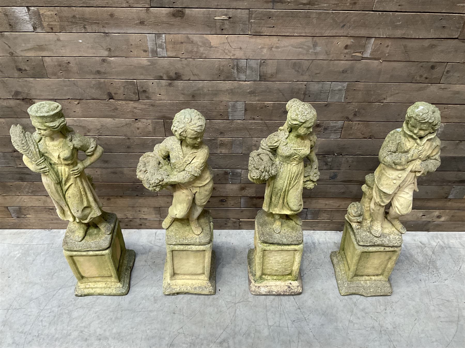 The Four Seasons - set of four cast stone garden figures on plinths