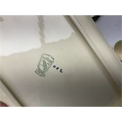 Clarice Cliff for Newport Pottery Corolla pattern tea and dinner wares, comprising triangular bowl, four side plates, two shallow bowls and teacup (a/f), together with a Clarice Cliff Wilkinson twin handled soup bowl and unassociated saucer both decorated with pink and yellow flowers, together with other mid century ceramics comprising Parrott and Company Coronet Ware, and Royal Staffordshire AJ. Wilkinson Ltd dinner wares