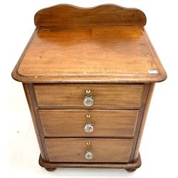 Victorian mahogany pedestal chest, raised shaped back, moulded top, three graduating drawers, turned supports 