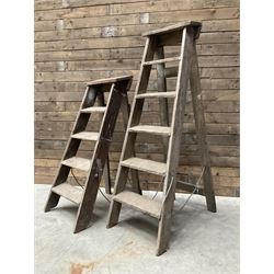 Two antique wooden step ladders, H100cm and 140cm