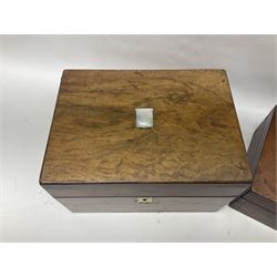 Walnut dressing table box, set with mother of pearl cartouche, opening to reveal a compartmentalised interior with mirror, covered in parts in purple velvet, together with a smaller jewellery box with stencil print, dressing table box H15cm
