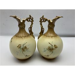 Pair of Turn Vienna blush ivory ewers decorated with floral sprays and gilt, H25cm