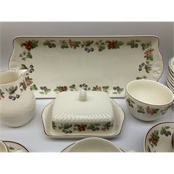 Wedgwood Queens Ware tea and dinner wares in Provence pattern, including ten cups and saucers, milk jug, butter dish with cover, ten dinner plates, ten bowls and ten side plates etc (71), together with Royal Doulton tea wares in Canton pattern, comprising six cups and saucers, milk jug, open sucrier and six dessert plates.    