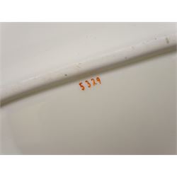 19th century Minton tea set, comprising twelve teacups, eleven saucers, fifteen side plates, cream jug, slop bowl, and two cake plates, decorated with panels of floral sprays, upon a green ground, heightened with gilt throughout, with printed puce mark beneath, and pattern number 5329
