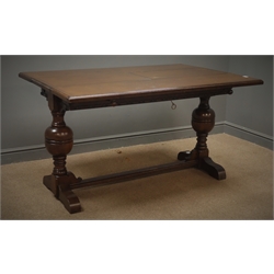  Early 20th century oak extending dining table, twin baluster supports joined by single stretcher, 'The Ee-zi-Way one motion extending table', 137cm x 95cm, H77cm  