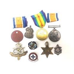  WW1 pair to 45154 Pte. T.Childs S.Staffs.R both with ribbons in packets of issue, South Staffs cap badge, an Atlantic Star, silver ARP and enamel Animal Guard badges, 1953 silver Long Jump fob and red dog tag to J.T.Childs, National Asylum Workers Union enamel badge, (9)  