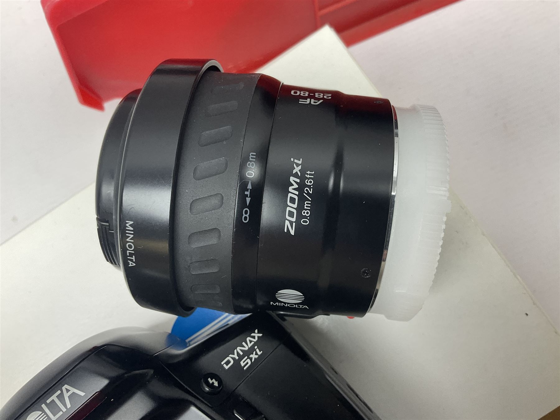 Minolta Dynax 5xi camera body serial no 17222646 with 'AF Zoom Xi 28-80mm 1:4(22)-56' lens serial no 17220881, Minolta SRT101 camera body serial 1944687, Lumix camera body serial no K6SC10168 etc 