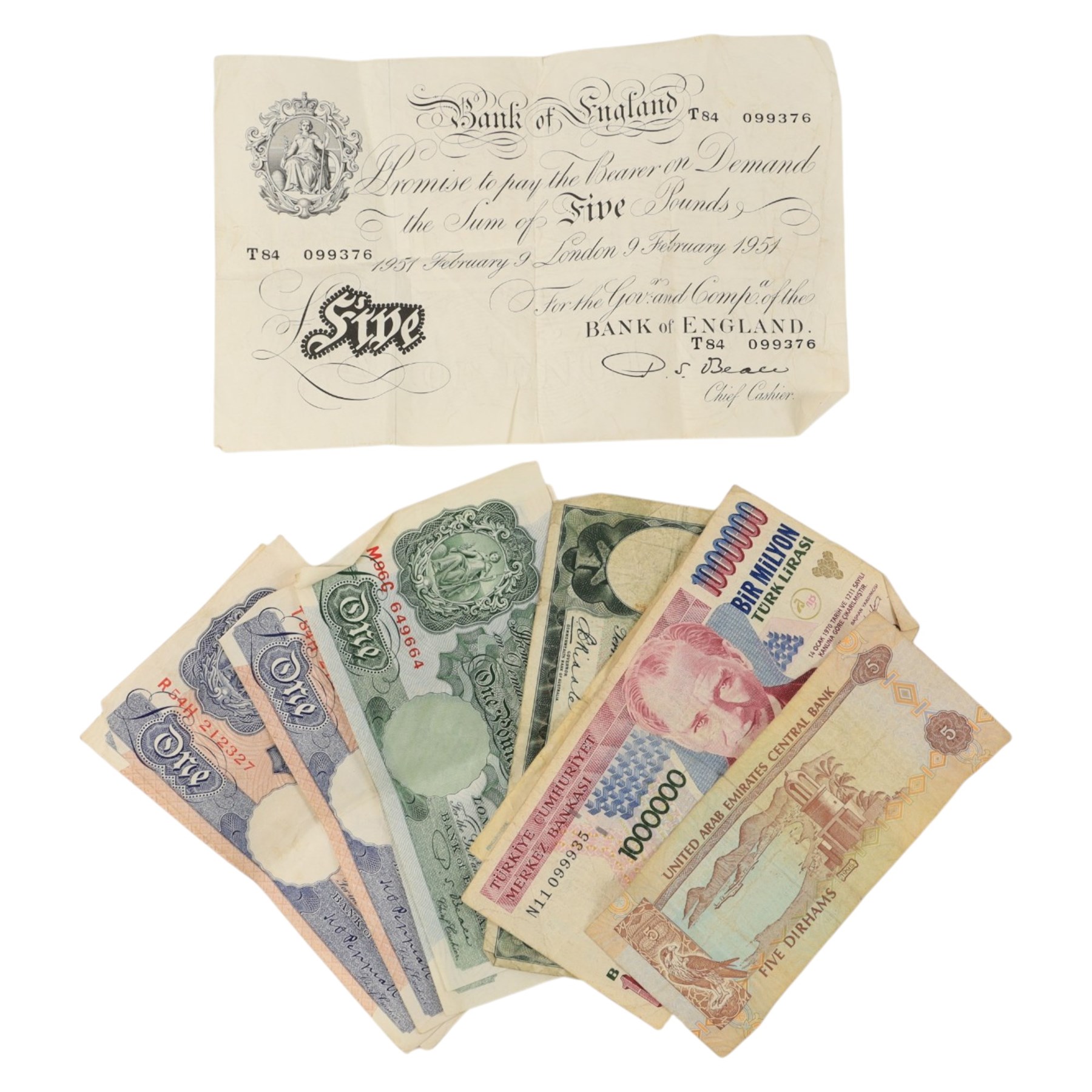 Queen Victoria 1889 silver double florin coin, four further silver coins, Queen Elizabeth II 2008 five pound coins, Bank of England Beale 1951 white five pound note, six Bank of England one pound notes, and further world banknotes