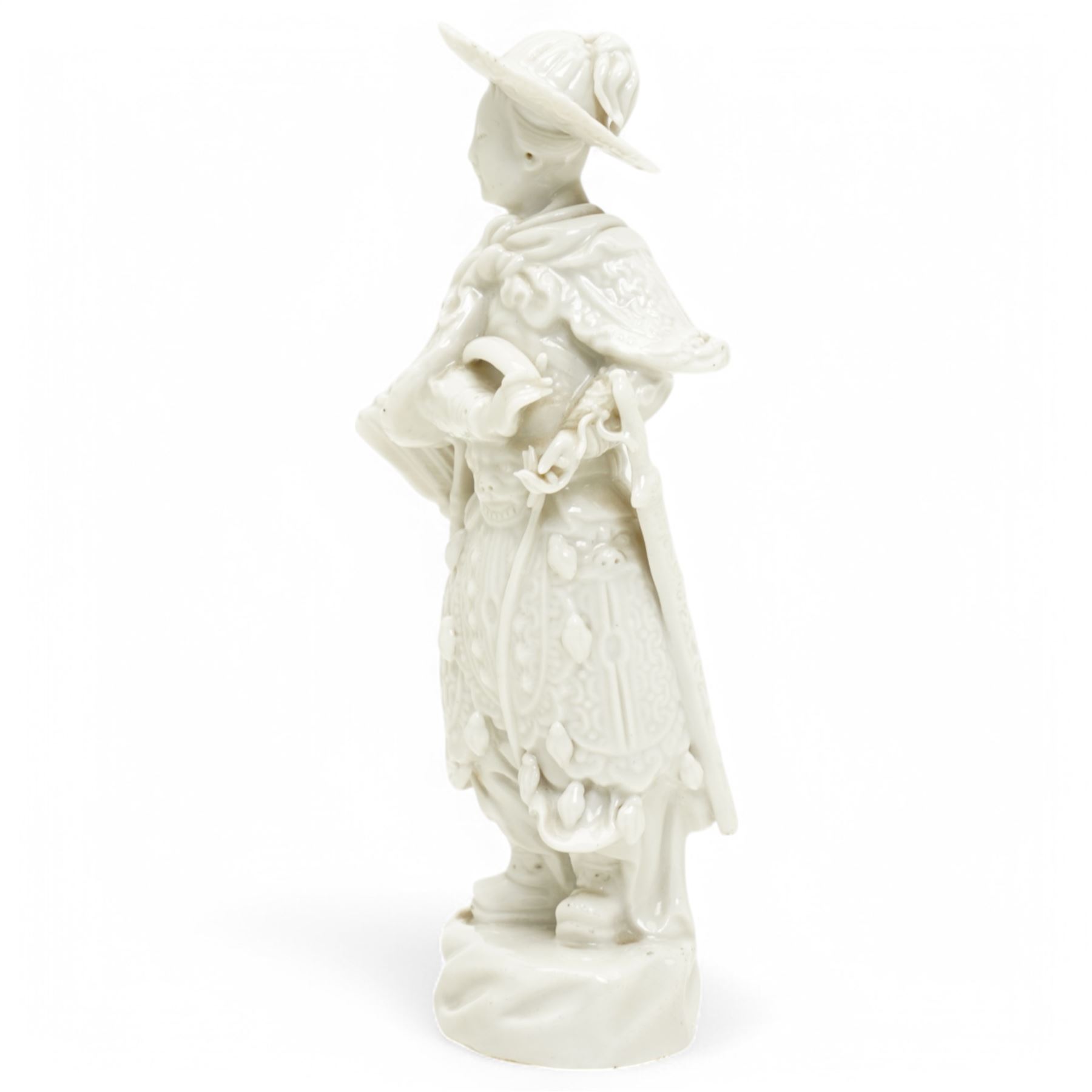 19th century blanc de chine figure of an archer with bow, quiver of arrows and a sword H17cm