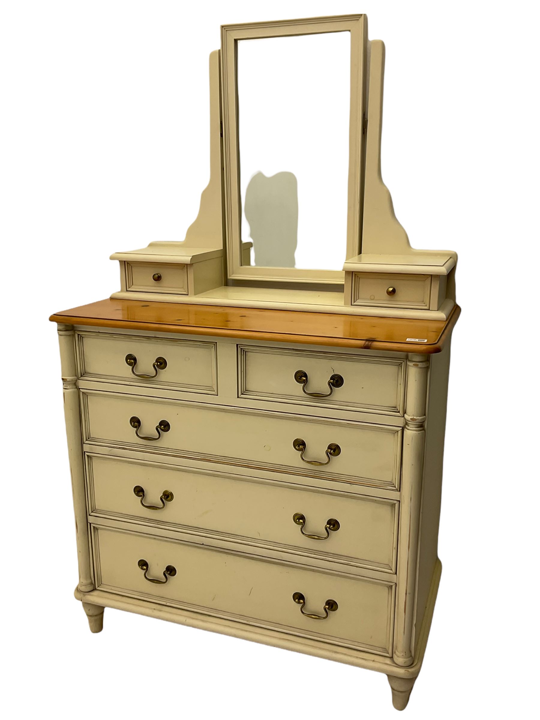 Laura Ashley pine and cream finish vanity chest, fitted with two short and three long drawers, swing mirror back