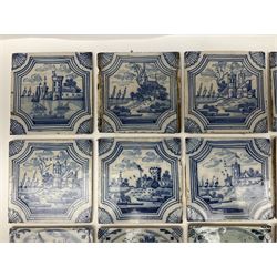 18th century Dutch Delft tiles painted in blue and white and manganese, decorated with buildings in landscapes, seascapes and figures, all within foliate spandrels, H13cm (27)