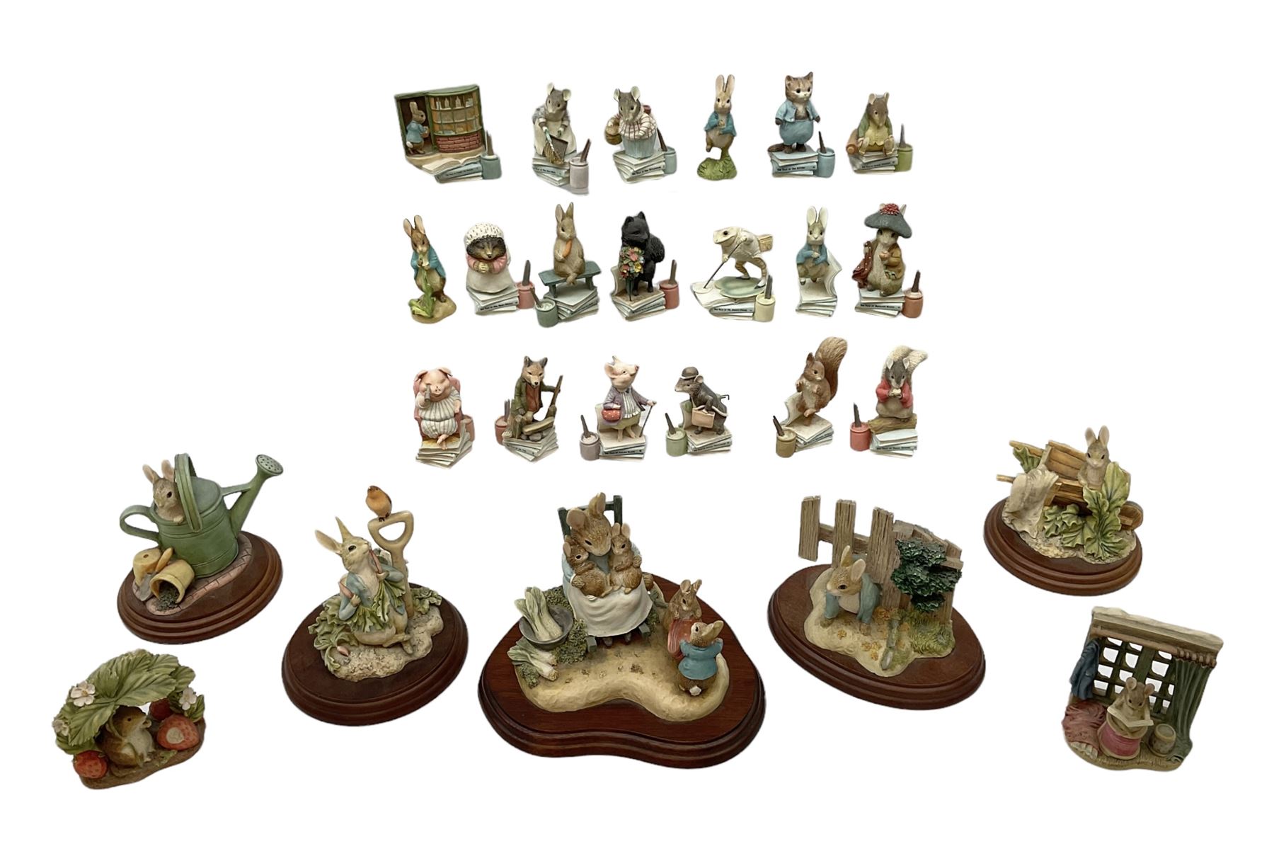 Frederick Warne & Co The World of Beatrix Potter figures to include Peter Rabbit in Mr Mcgregor's Garden, Peters Hiding place, Mrs Tiggy Winks, The Tale of Jonny Town-Mouse, etc, many with original boxes 
