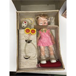 Two boxed Bradgate Penny Puppywalker dolls; Garfield soft toy and Panini sticker album; boxed Stylophone with instructional 45rpm record; and other toys