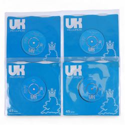 10CC memorabilia, including 2012 Tenology CD, DVD, postcard and book boxed set, nine 7 inch singles, three CDs and a signed Graham Gould photograph