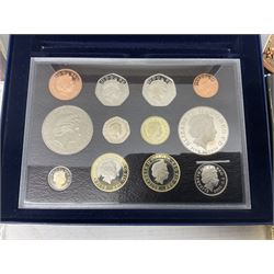 The Royal Mint United Kingdom 2005 proof coin set, with certificate, 2009 'Henry VIII' brilliant uncirculated fine pound coin, 2010 brilliant uncirculated coin collection, 2015 'The Fourth and Fifth Circulating Coinage Portrait Collection', and 'Farewell and Nations of the Crown UK' one pound brilliant uncirculated two coin set, all cased or in card folders