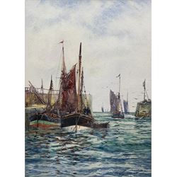 Frank (Frederick) William Scarborough (British 1860-1939): Whitby and Kirkcaldy boats in Harbour, watercolour signed 33.5cm x 24cm 
Provenance: with the Mangate Gallery London, label verso