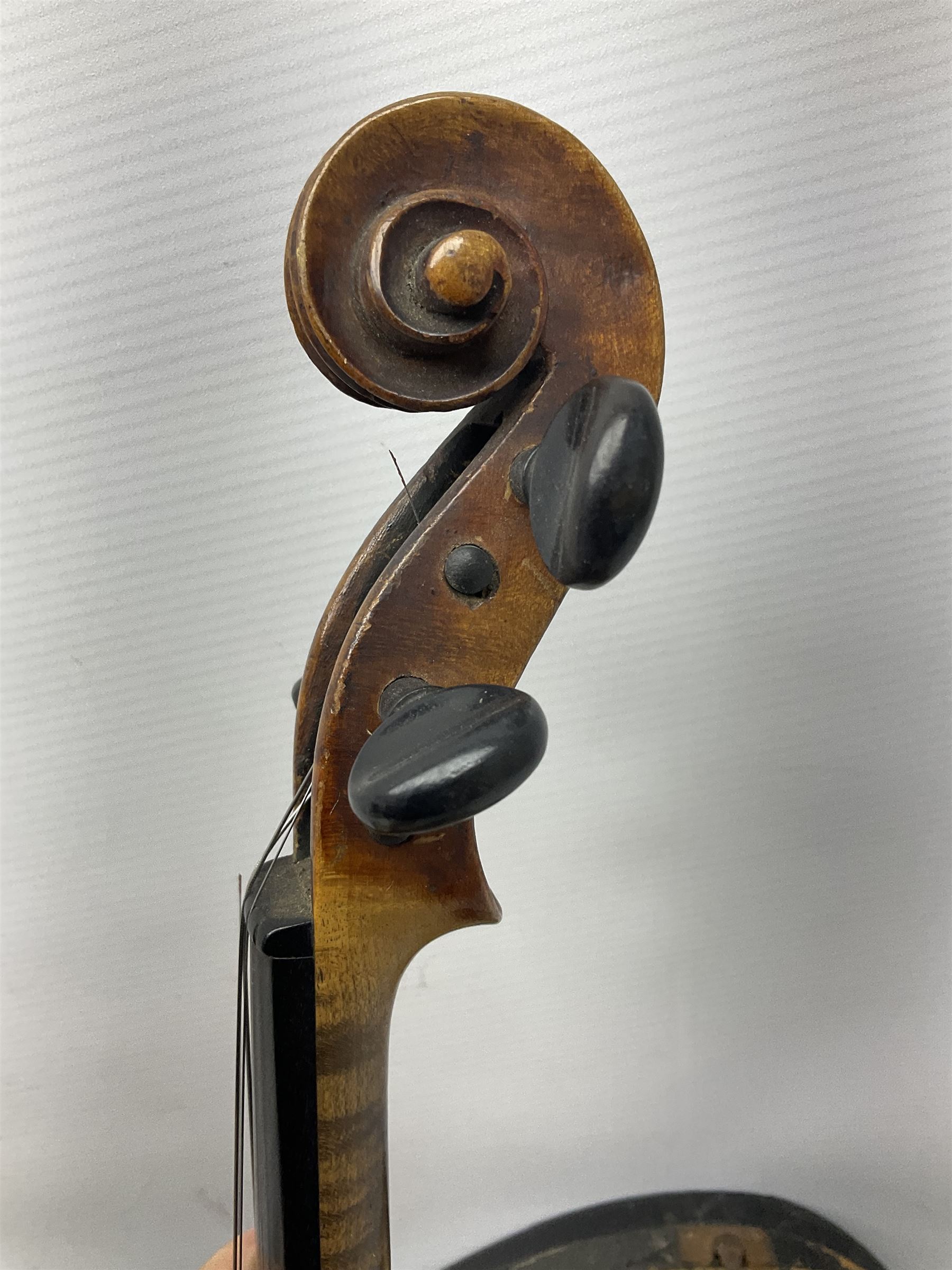 German copy of a Maggini violin c1900 with 35.5cm two-piece maple back and ribs and spruce top, bears label 'Maggini Deutsche Arbeit 1866' L59cm; in carrying case with bow