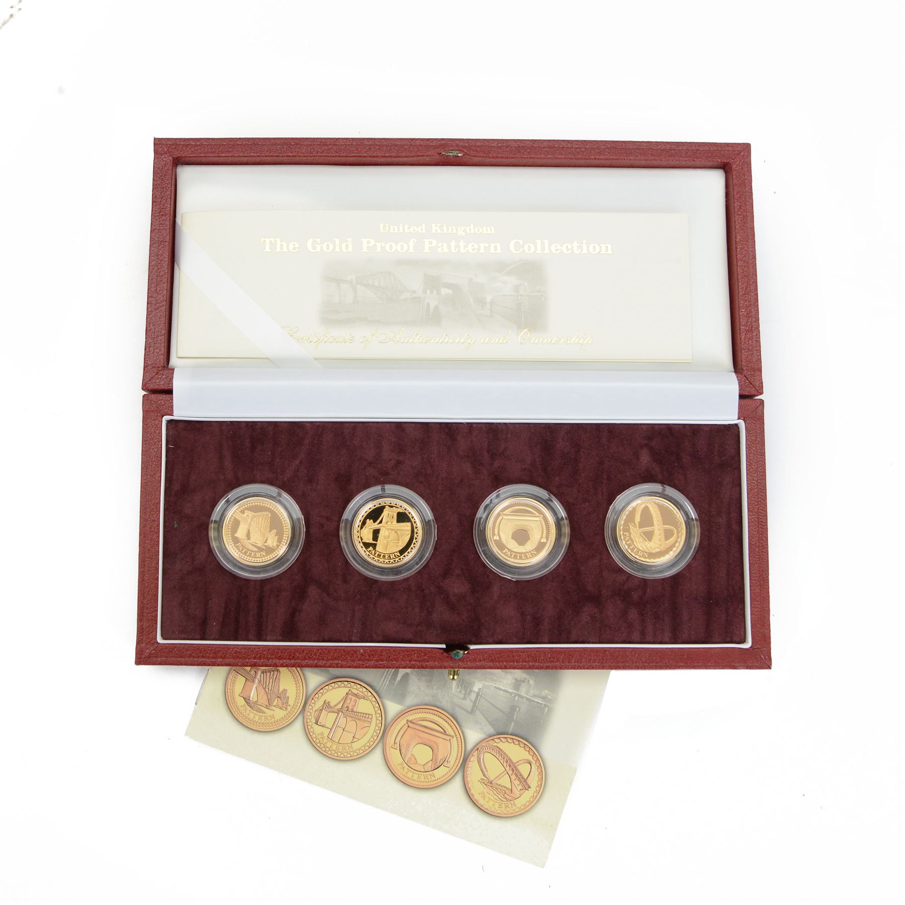 The Royal Mint United Kingdom gold proof pattern four coin set, comprising 'Forth Rail Bridge', 'Menai Straits Suspension Bridge', 'Egyptian Arch Railway Bridge' and 'Gateshead Millennium Bridge', cased with certificate