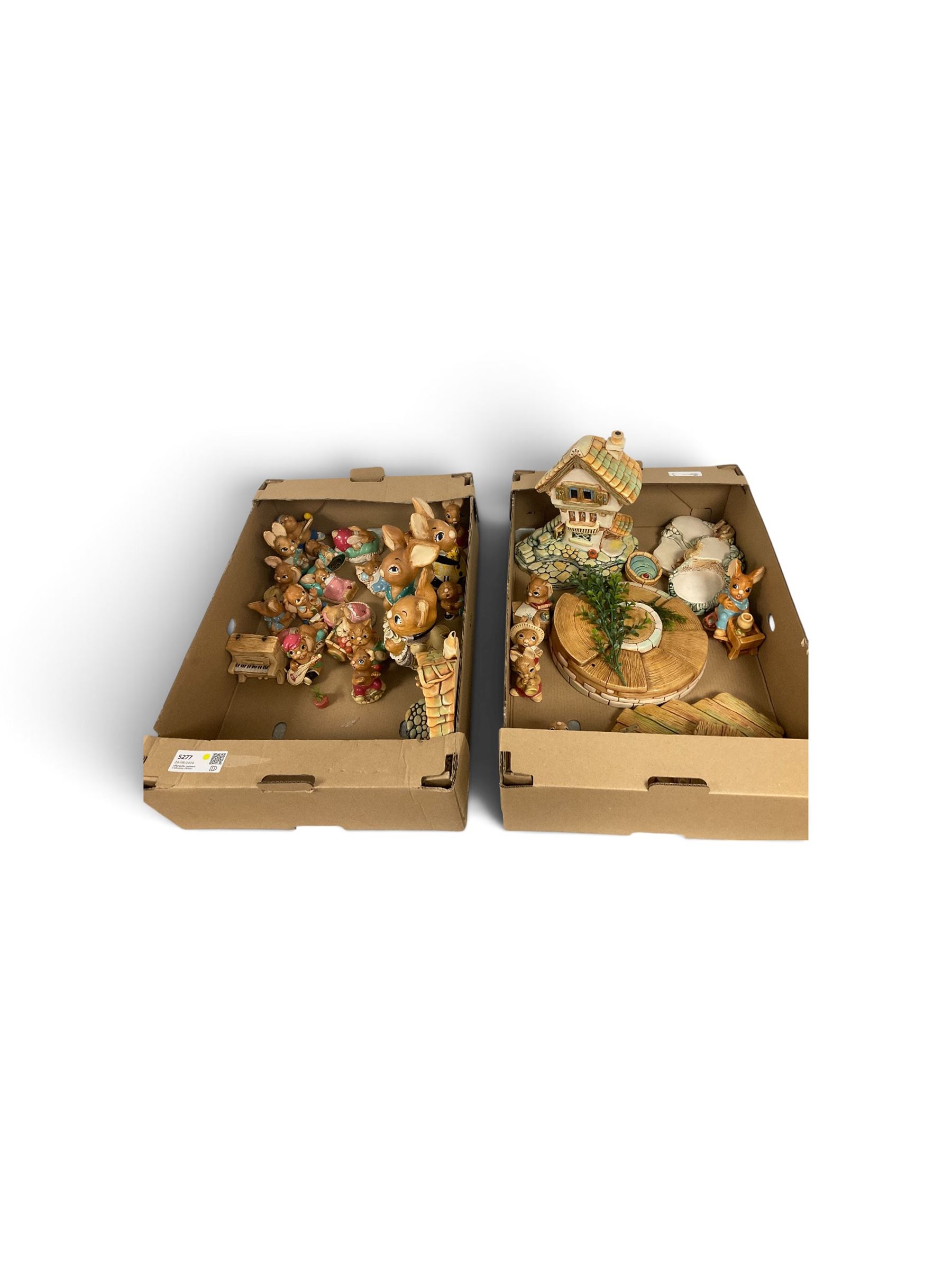 Collection of Pendelfin figures and stands 