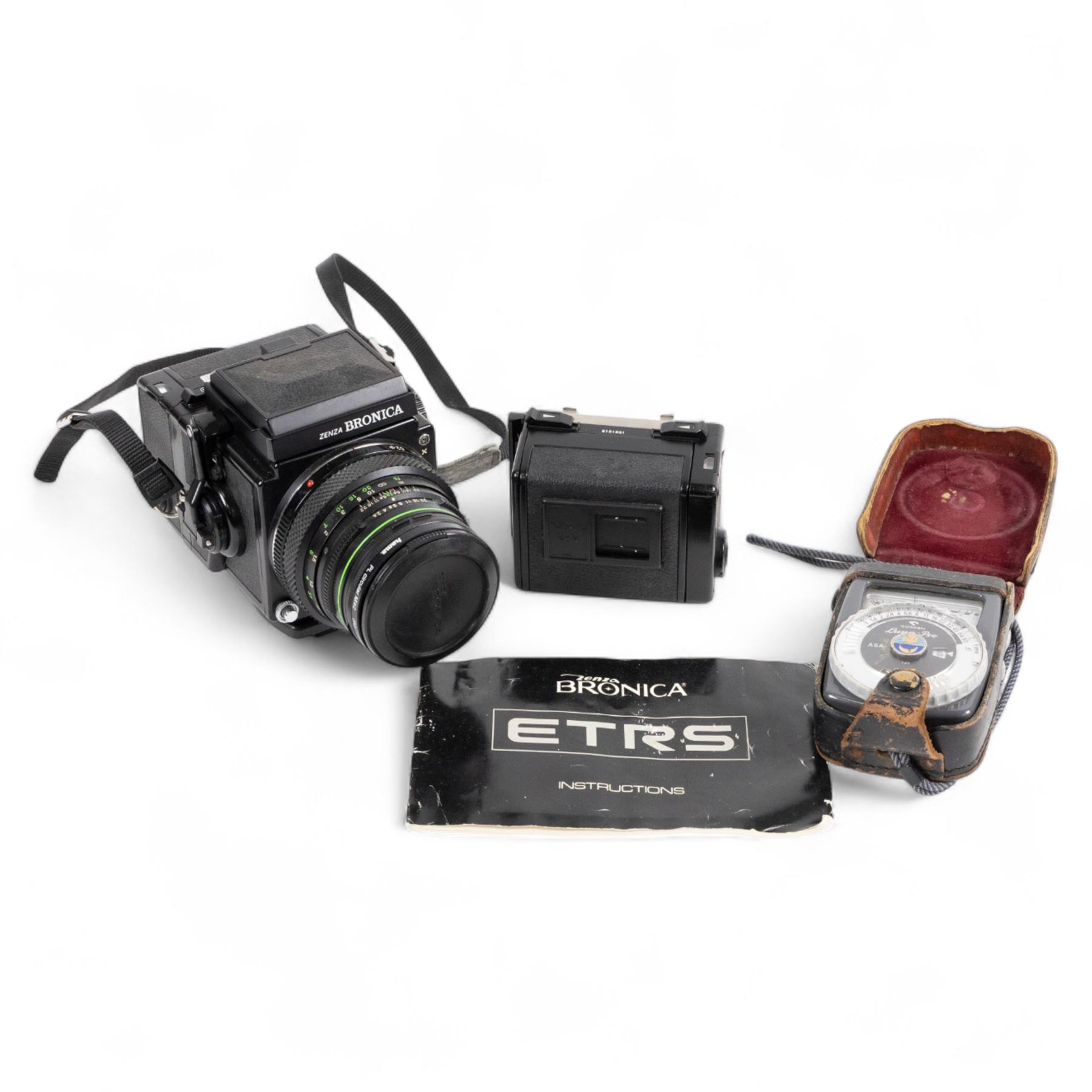 Zenza Bronica ETRS medium format camera, serial no. 8301079, with Zenza Bronica Zenzanon EII 1:2.8 f=75mm lens with lens cap, serial no. 7955198 and two film backs and instruction booklet