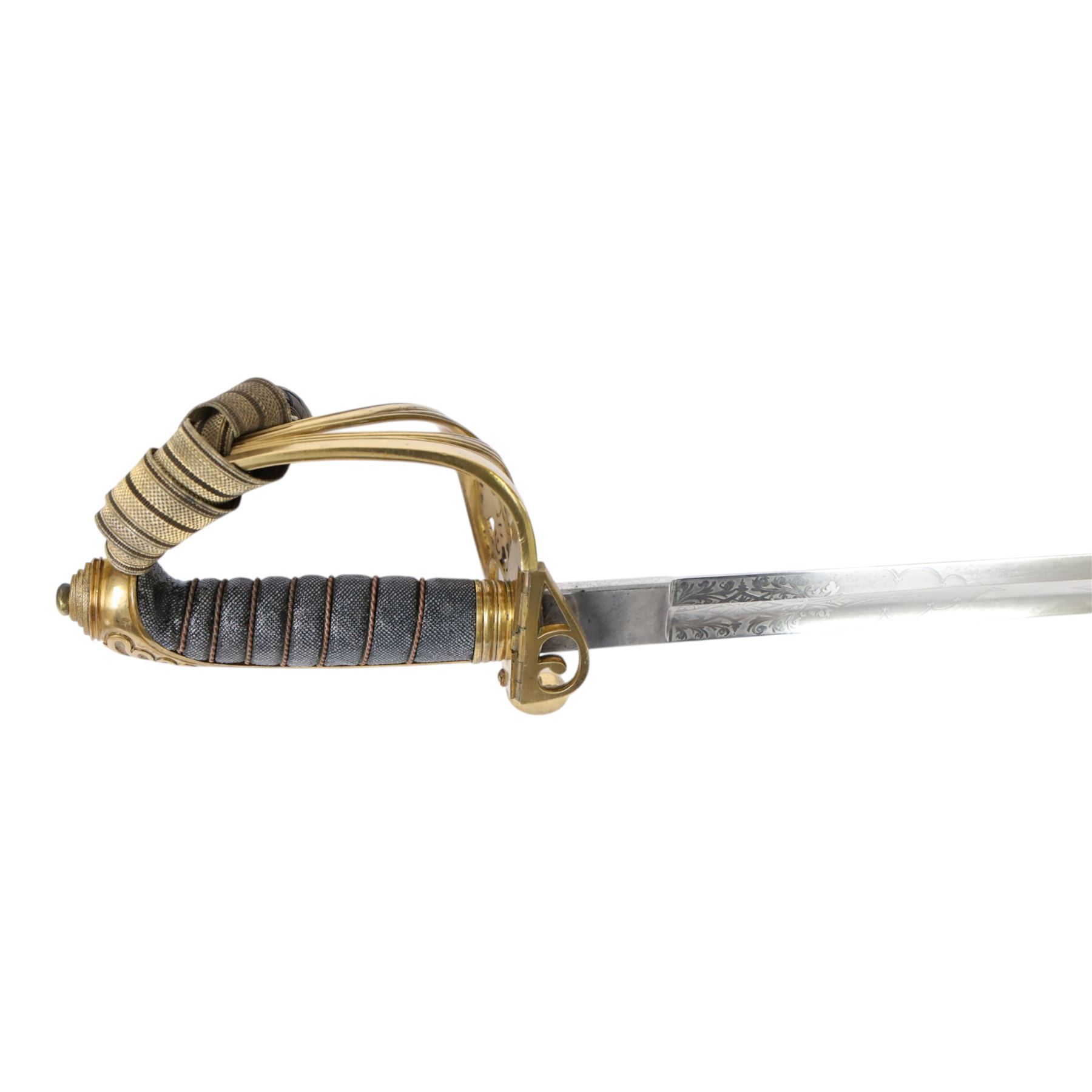 British 1822 pattern, named, infantry officers' sword, the 82cm slightly curved and fullered single edged blade engraved on both sides, bears the Victorian coat of arms and the owners initials 'GB', ricasso marked Grindlay & Co London, the brass basket guard with Victoria cartouche and fold down rear flap, shagreen bound grip with original wire binding and gilt sword knit, with brass scabbard, twin suspension rings and steel chape mount, overall L102cm  