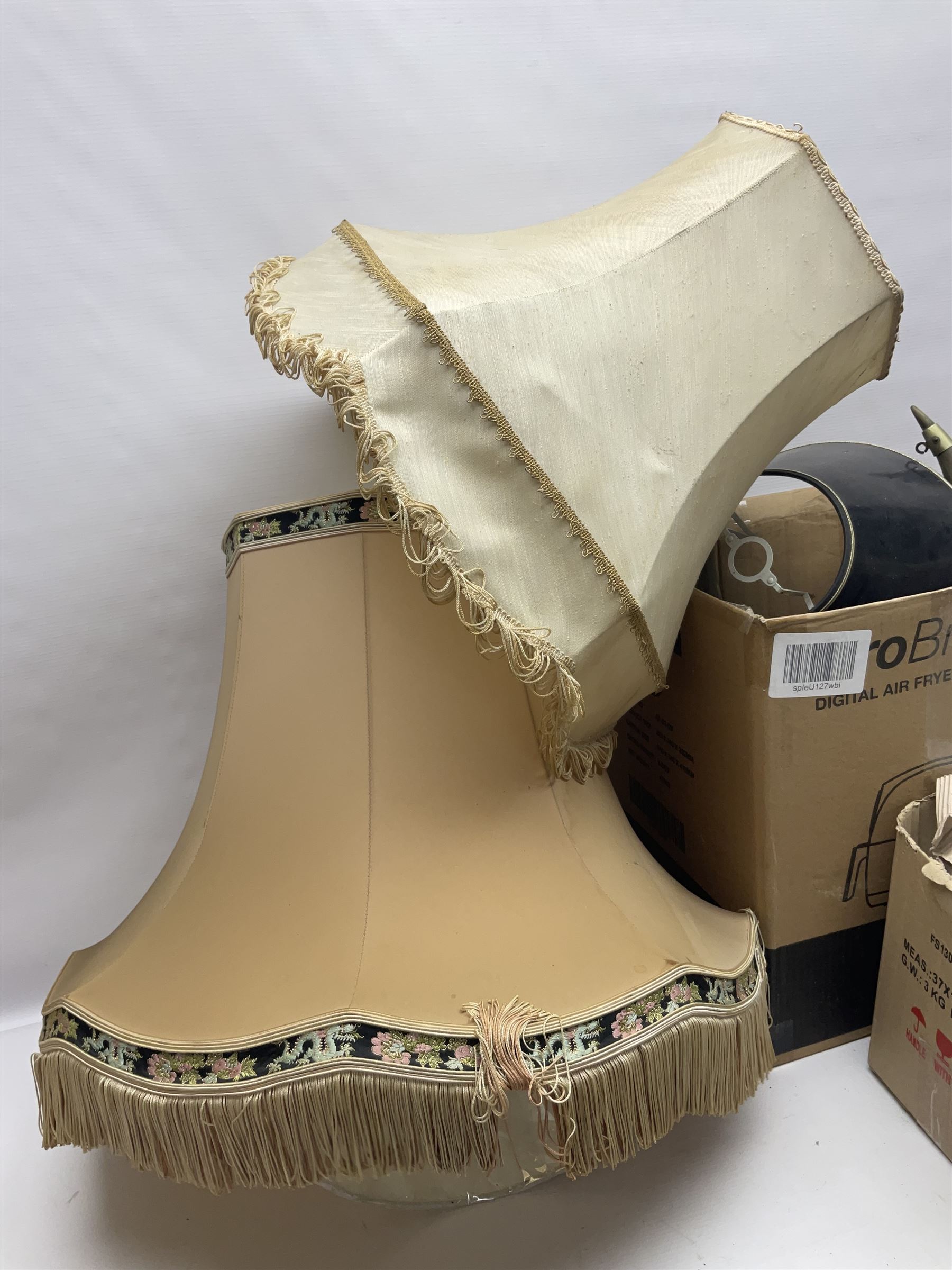 French Adrian helmet and cow horn gong stand; and quantity of lamp shades, etc, helmet H47cm