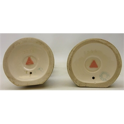  Pair of Royal Dux figures, depicting water carriers on circular base, pink triangle mark to base, H29cm  
