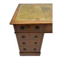 Howard & Sons. - 19th century walnut twin pedestal desk, moulded rectangular top with tooled leather inset, fitted with nine drawers with circular pressed brass handle plates decorated with urns, each drawer fitted with a 'Hobbs, London' lock, on plinth base, the upper right-hand drawer stamped 'Howard & Sons, Berners St.' and with paper label