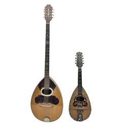 Italian bouzouki type long necked mandolin with segmented lute back and spruce top with tortoiseshell style panels; bears label 'Miroglio & Figli Sicilia Catania Italia' L99cm; and Italian lute back mandolin with segmented back and spruce top bearing label for F. De Mureda Napoli (2)