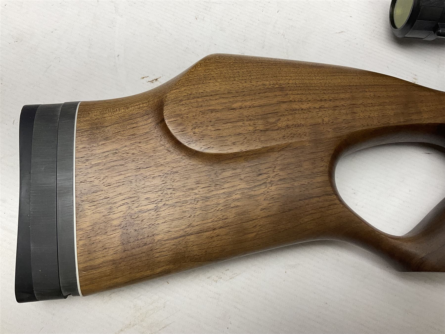 Weihrauch Sport HW100 .177 calibre PCP repeating air rifle; walnut thumbhole stock with textured pistol-grip; fourteen-shot magazine; Nikko Stirling Gameking 3.5 -10x44 illuminated telescopic sight; No.1922087 L90cm overall; in Napier fleece lined gun sling; with re-filling air tank and quantity of pellets NB: AGE RESTRICTIONS APPLY TO THE PURCHASE OF AIR WEAPONS.