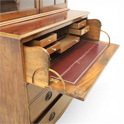 George III mahogany secretaire bookcase, the upper section with projecting cornice above astragal glazed doors, with three adjustable shelves, the lower section with secretaire drawer, fitted and with tooled leather writing surface, inlaid drawer fronts with brass handles, three graduating drawers below, raised on bracket feet