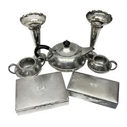 Three piece Arts and Crafts style hammered pewter tea service, comprising teapot, open sucrier and milk jug, together with a pair of silver plated trumpet vases and two Aristocrat silver plated cigarette boxes, each with engine turned decoration and engraved initials, vases H19.8cm