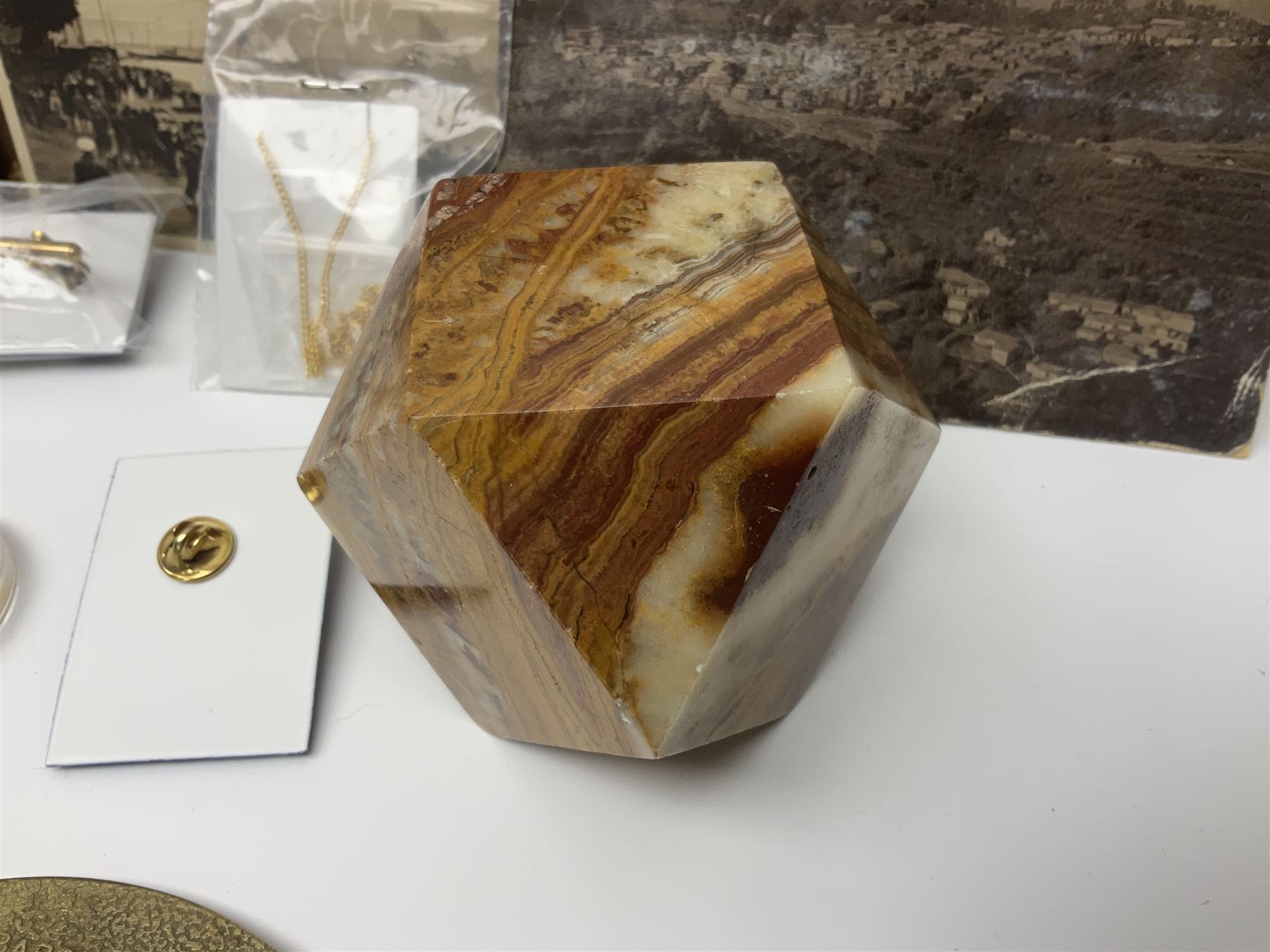 Studio Danielle Old English Sheepdog jewellery including two pairs of cufflinks, necklace and pin, together with similar belt buckle, hardstone tetradecahedron paperweight, postcards and an Imperial War Museum Falklands Conflict coin