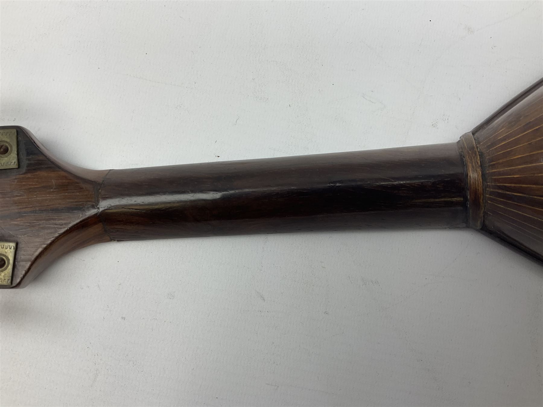 Italian mandolin, with foliate inlaid scratchplate, paper label inscribed 'Carlo Loveri & Figlio of Napoli', L62cm