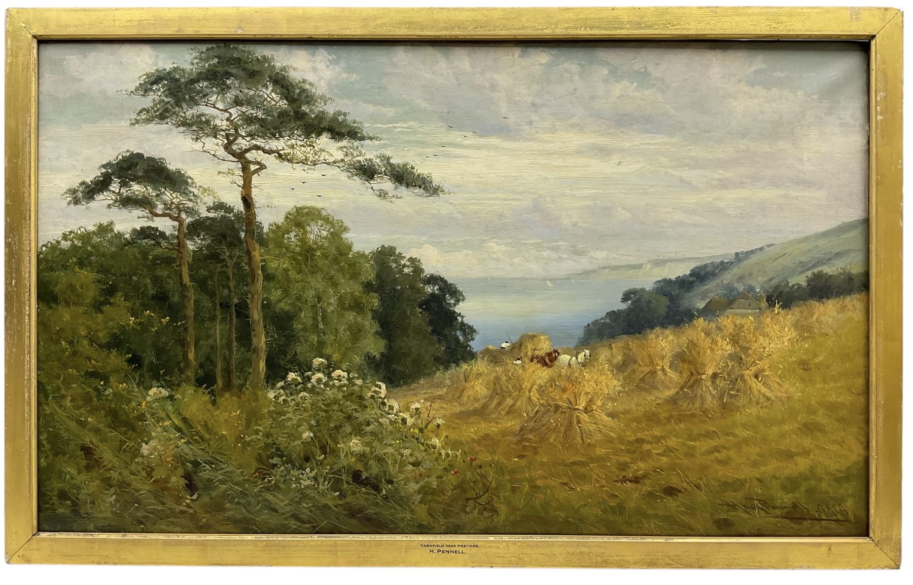 Harry Pennell (British 1879-1934): 'Cornfield near Hastings', oil on canvas signed, titled on the slip, further inscribed verso 60cm x 101cm 