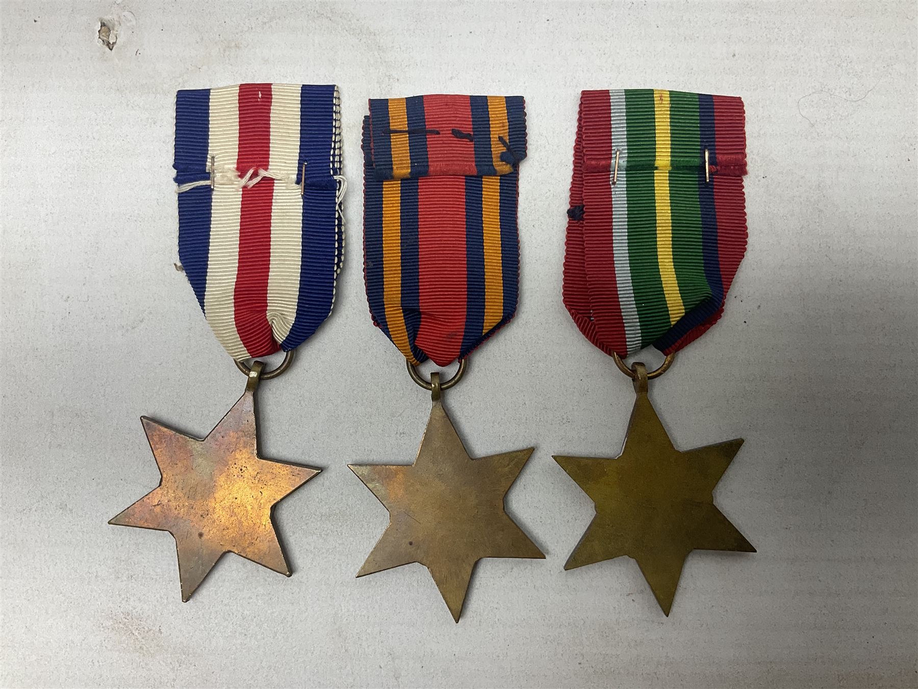 WW2 Canada Volunteer Service Medal 1939-45 with maple leaf clasp; and five WW2 Stars - Burma Star, Atlantic Star, Africa Star with 8th Army clasp, France and Germany Star and Pacific Star with Burma clasp; all with ribbons (6)