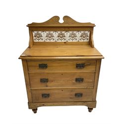 Victorian pine wash chest, raised pediement over tiled back, fitted with three long drawers, on turned feet
