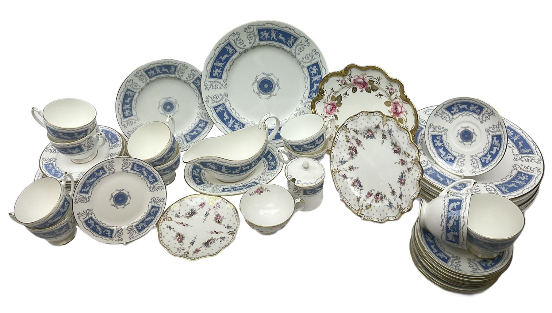 Coalport Revelry pattern tea and dinner wares, comprising nine dinner plates, four salad plates, eleven side plates, sauce boat and stand, ten teacups and ten saucers, and preserve pot and cover, together with a Coalport plate of shaped form decorated with pink roses, and a Royal Crown Derby Royal Antoinette pattern trio