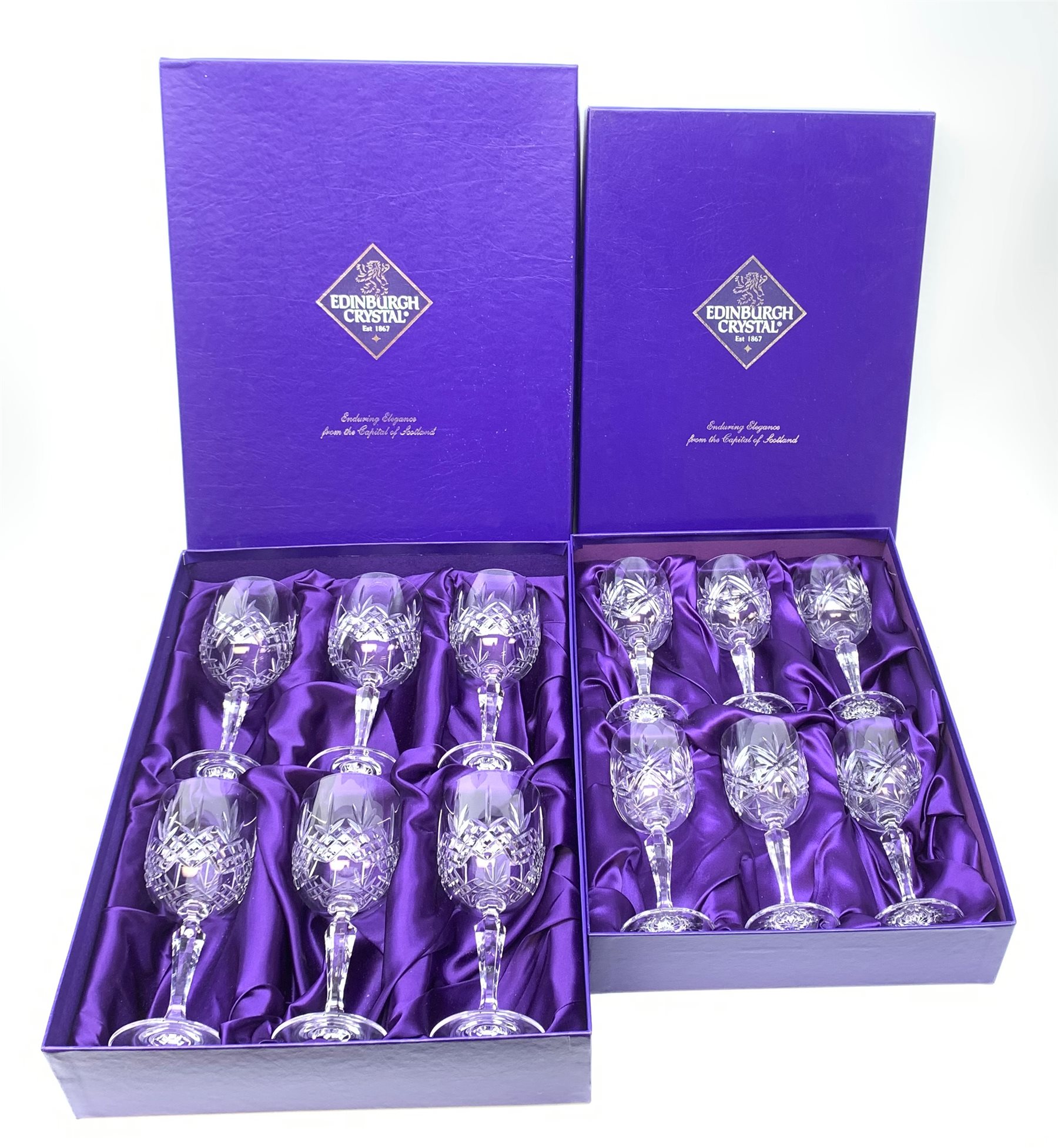 A boxed set of six Edinburgh Crystal wine glasses, together with a