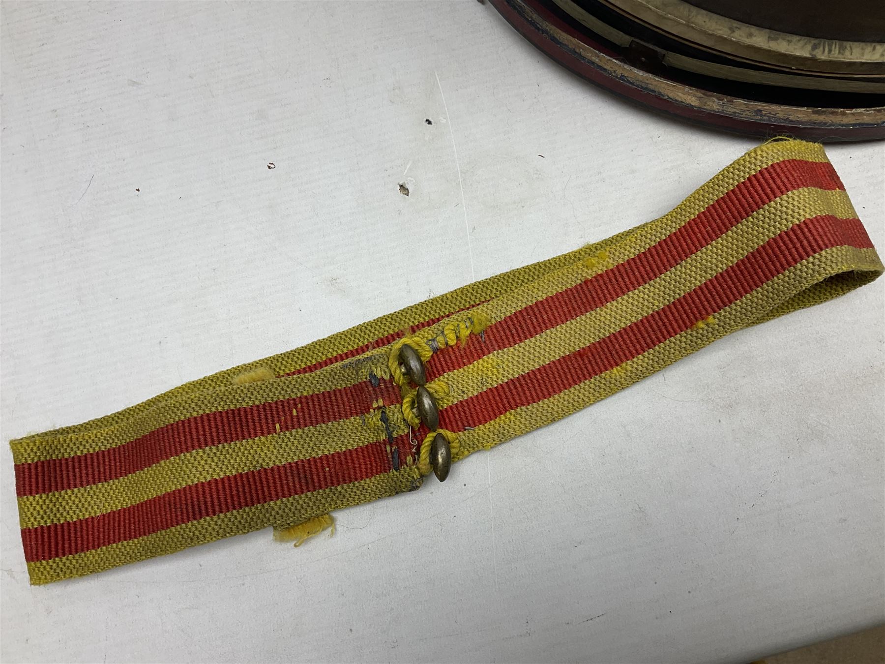Disassembled early 20th century Boys Brigade snare drum D37cm with copy WW1 period photograph of the Kirbymoorside Boys Brigade; early 20th century hardwood clarinet; bagpipes chanter; and Dulcet E-flat penny whistle