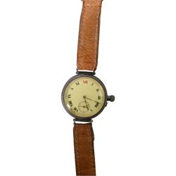 Silver cased trench watch enamel dial with Roman numerals, red XII, Longines movement, used in the Boer war, inscribed to the back 'E M Everitt From W.E Everitt 1882' 