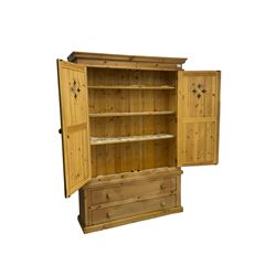 Traditional pine housekeeper's cupboard, two panelled doors with pierced lozenge decoration enclosing three shelves, fitted with two drawers to base