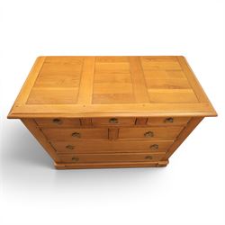 Solid oak chest, fitted with an arrangement of five short and two long drawers