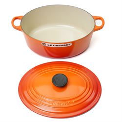 Le Creuset oval casserole dish and cover,  and another shallow example, in the Volcanic colourway