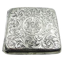 Edwardian silver cigarette case, of rounded rectangular form with engraved scrolling foliate decoration and central panel with monogram, hallmarked S Blanckensee & Son Ltd, Birmingham 1907, H8.5cm W9cm, approximate weight 3.22 ozt (100.3 grams)